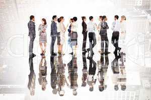 Composite image of many business people standing in a line