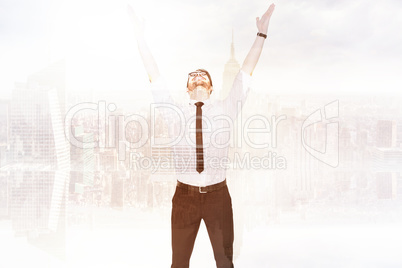 Composite image of smiling businessman cheering with his hands u