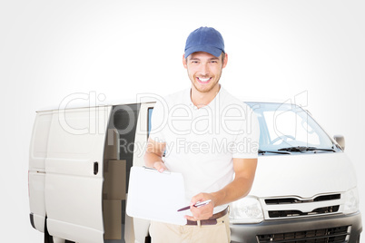 Composite image of happy delivery man holding clipboard
