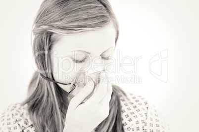 Depressed female patient with a mask