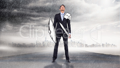 Composite image of corporate warrior