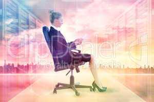 Composite image of businesswoman sitting on swivel chair with ta