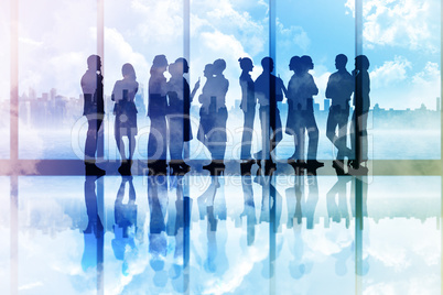 Composite image of many business people standing in a line