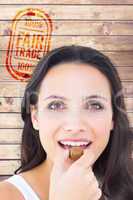 Composite image of pretty brunette eating chocolate candy