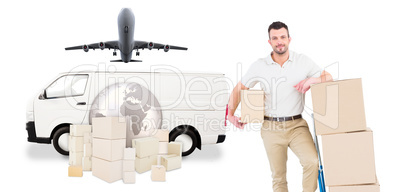 Composite image of delivery man with trolley of boxes