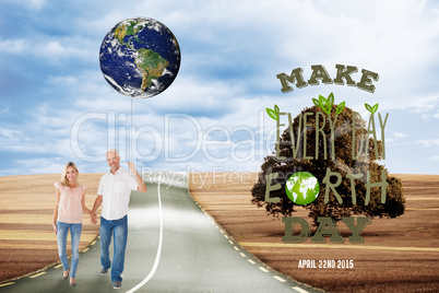 Composite image of happy couple walking holding hands