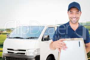 Composite image of happy delivery man with package and clipboard