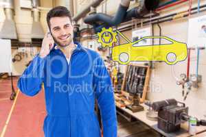 Composite image of smiling male mechanic using mobile phone