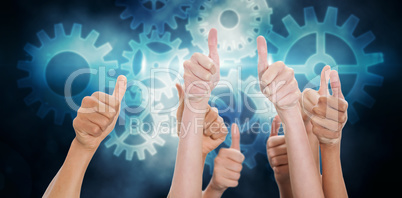 Composite image of hands up and thumbs raised