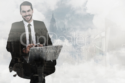 Composite image of happy businessman with laptop using smartphon
