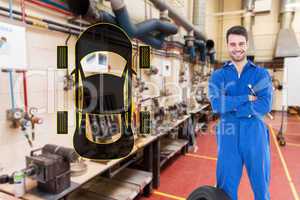 Composite image of smiling mechanic with arms crossed standing b