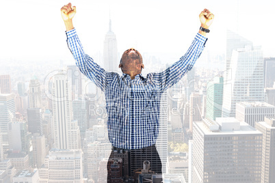 Composite image of excited businessman cheering Composite image of excited businessman cheering