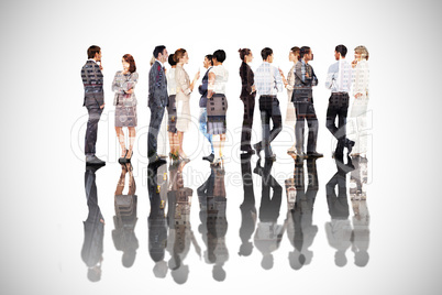 Composite image of many business people standing in a line