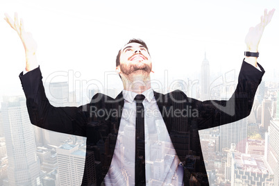 Composite image of businessman cheering with hands raised Composite image of businessman cheering with hands raised