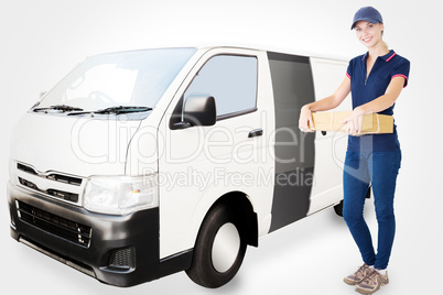 Composite image of happy delivery woman holding cardboard box