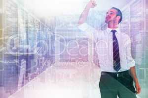 Composite image of businessman cheering with clenched fist