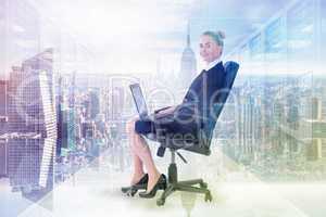 Composite image of businesswoman sitting on swivel chair with la