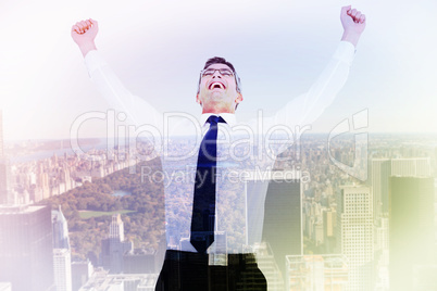 Composite image of excited businessman with glasses cheering Composite image of excited businessman with glasses cheering