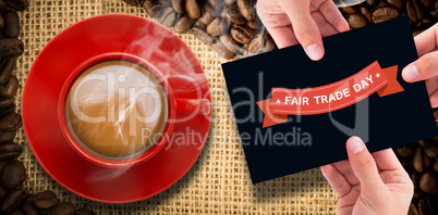 Composite image of hand showing card