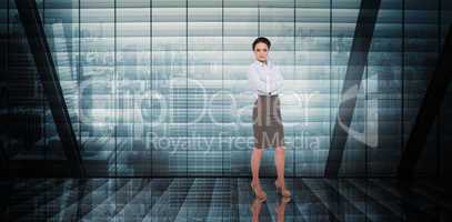 Composite image of businesswoman with arms crossed