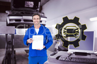Composite image of confident mechanic showing blank clipboard