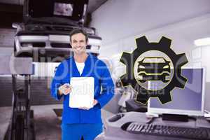 Composite image of confident mechanic showing blank clipboard