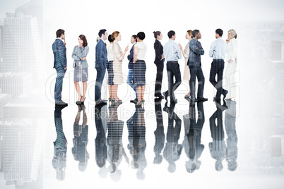 Composite image of many business people standing in a line