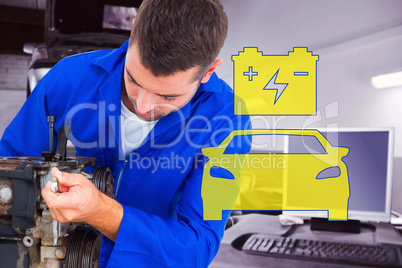 Composite image of male mechanic repairing car engine
