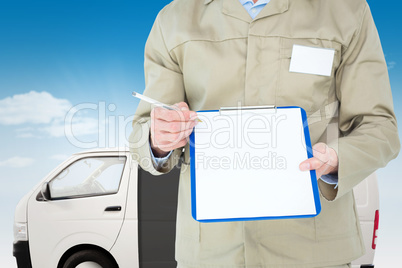 Composite image of delivery man showing blank paper on clipboard