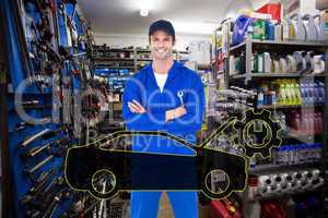 Composite image of confident mechanic holding wheel wrenches