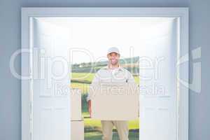 Composite image of courier man carrying cardboard box