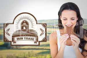 Composite image of pretty brunette eating bar of chocolate