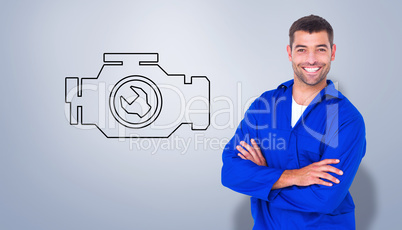Composite image of mechanic standing arms crossed on white backg