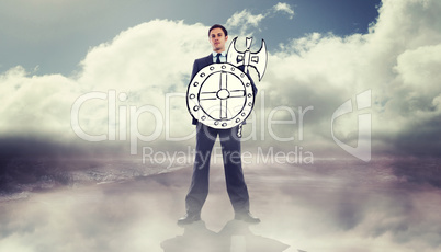 Composite image of corporate warrior