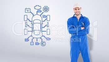 Composite image of male mechanic standing arms crossed on white