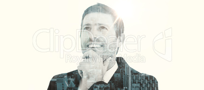 Composite image of businessman smiling and thinking