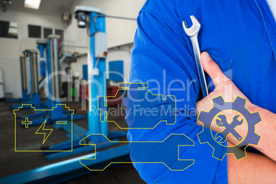 Composite image of male mechanic holding spanner on white backgr