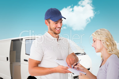 Composite image of happy delivery man getting signature from cus