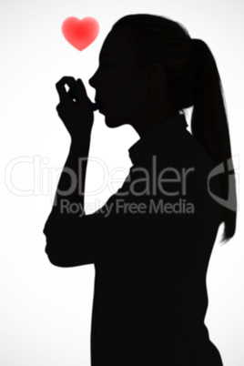 Composite image of beautiful blonde using an asthma inhaler