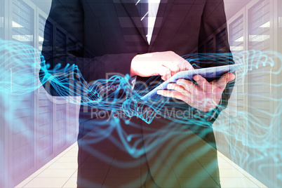 Composite image of businessman touching his tablet pc