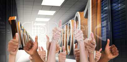 Composite image of hands showing thumbs up