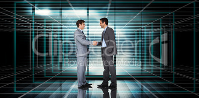 Composite image of businessmen shaking hands