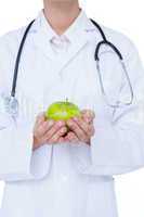 Doctor holding green apple