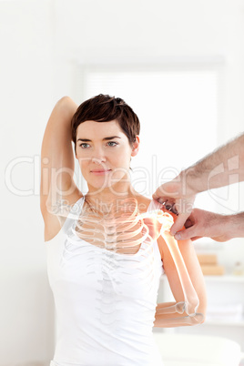 Highlighted bones of woman at physiotherapist