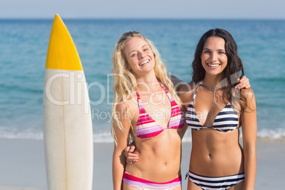 two friends in swimsuits