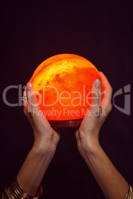 Fortune teller holding crystal ball