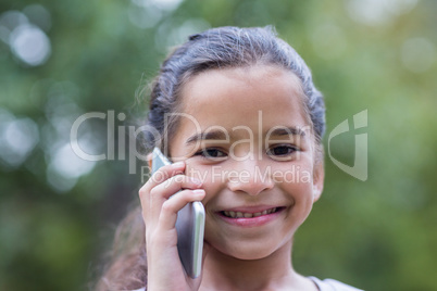 Little girl using her phone Little girl using her phone