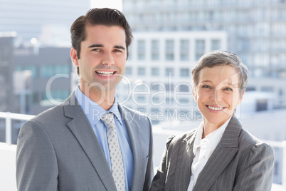 Business colleagues smiling at camera