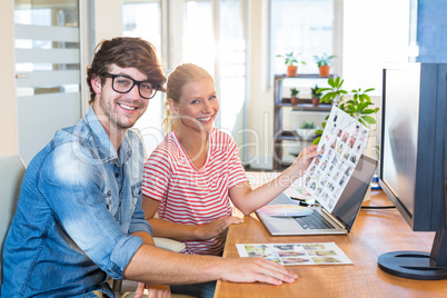 Smiling designers working together