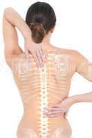 Highlighted spine of woman with back pain